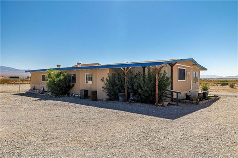 Experience the serenity of nature at 6901 Mountain View Ave, Pahrump, NV 89060.** This charming 2-bedroom, 2-bath home sits on 2.5 acres, offering ample privacy on the far north side of Pahrump. With a **guest house**, RV garage, and extended patio, ...