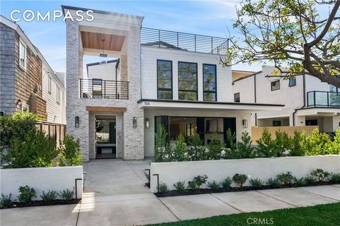 An enchanting modern oasis nestled in the coveted heart of Corona del Mar, where sleek architecture harmonizes with sultry elegance. This exquisite 2,139-square-foot, two-bedroom sanctuary is suffused with natural light, its open layout exuding an ai...