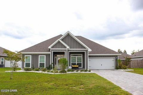 Welcome to 140 Martingale Loop, a beautifully maintained 5-bedroom, 3-bathroom home nestled in the heart of Lynn Haven, FL. This inviting property seamlessly combines comfort and style, making it an ideal choice for families and individuals alike. Th...