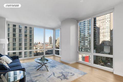 Residence 1201 combina el confort moderno con la icónica ciudad de Nueva York y las vistas parciales al río. Cuenta con un diseño de planta abierta de 988 pies cuadrados, pisos de madera, ventanas del piso al techo y acabados contemporáneos en todas ...