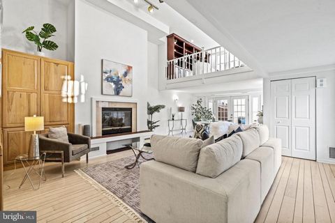 Located in the heart of Washington Square West within the desirable French Village Community, this sun lit home has 3 large bedrooms, 2.5-baths, garage parking, three outdoor spaces and offers urban convenience with an open, airy interior. Natural li...