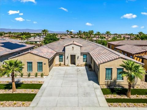 Welcome to unparalleled luxury behind the gates of Stone Creek in La Quinta - an exclusive estate that defines refined desert living. Step through the grand entrance into an expansive 4-bedroom suite residence, each with its own luxe bath plus an add...