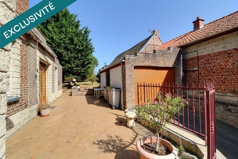 Maison individuelle d'environ 100 m2, grand jardin, garage et atelier. Potentiel 4 chambres.