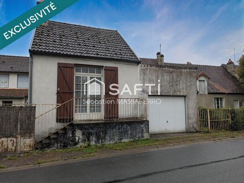 Maison à rénover avec garage, cave et dépendance
