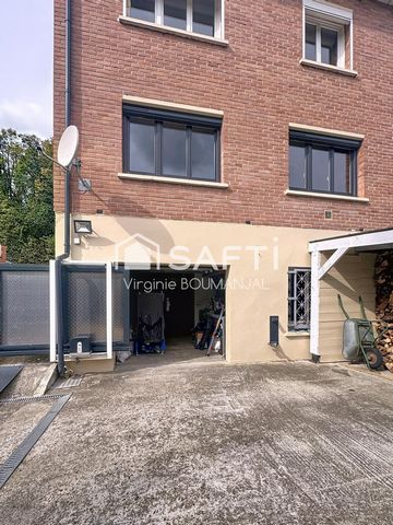 Maison semi mitoyenne de 82 m2 avec sous sol et garage.