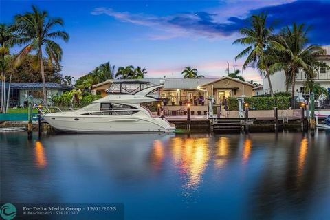 This reimagined Venetian Isles estate, with 90 feet on the water and a dock, beckons those who seek the pinnacle of waterfront living. Details include two primary suites, marble and new porcelain-tile flooring, handsome millwork, plantation shutters,...