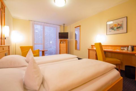 The room offers you everything you need. Air conditioning, Smart TV, comfortable bed, inviting armchair, desk and a large bathroom including sustainable cosmetic products. Our comfort double rooms are equipped with Lattoflex bed systems. Lattoflex ad...