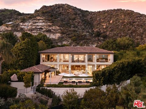 One of a kind architectural masterpiece in the Pacific Palisades just minutes from The Village. Jet Liner views from the Los Padres Mountains to the coastline of Santa Monica Bay and 