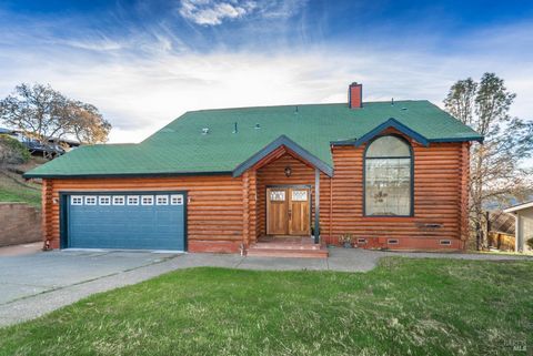 Your Potential Dream Lake Retreat! Uncover the charm of this spacious 4-bedroom, 2.5-bathroom log cabin, spanning 2,028 square feet on approximately 1/4 acre, just moments from the captivating lake. Immerse yourself in stunning sunset views and the p...