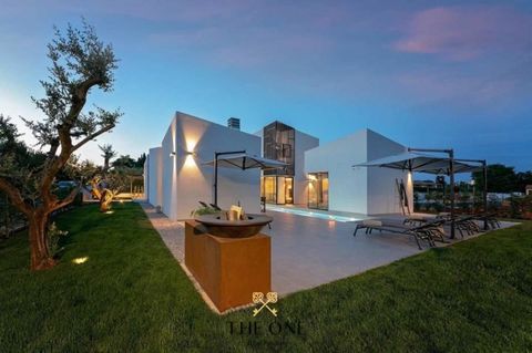 Spectacular designer villa with panoramic view, located only 10 km from Novigrad and Poreč, stands out for its unique architectural solution and superb design. The concept of the villa through 5 apparently separate buildings is actually connected by ...