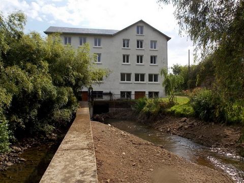 Large water mill with views on the edge of a historic town. The current accommodation is on 3 floors and has been set up as 3 large apartments divided into with several rooms. There is also a large basement and an attic with a low ceiling for storage...