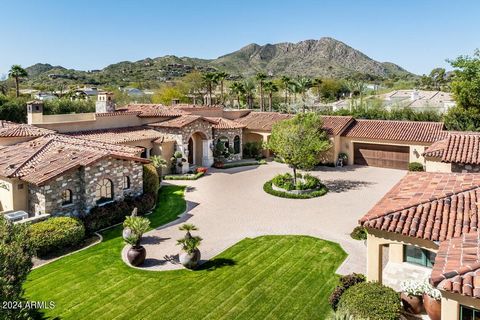 This home has a beautiful presentation! It is an absolutely gorgeous walled gated estate. Enter thru a dramatic stone archway into an elegant courtyard with a large circular paver drive to the main residence which is not visible from the street. The ...