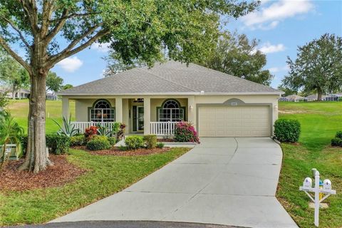 Presenting 2245 Elverson Avenue, a stunning single-family home located in the heart of the serene 55+ gated golf community in Clermont, FL. This meticulously maintained 2-bedroom, 2-bath residence spans 1,892 square feet, offering a blend of modern c...