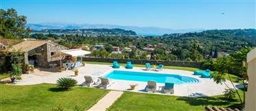 Luxury Villa with spectacular views of the ocean and Corfu town Sitting on a plot of 2700 sq meters, this Villa near Viros, provides a magnificent range of stylish accommodation and luxury. The property is spacious with all the modern amenities and i...