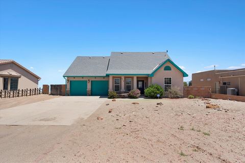 PRICED TO SELL and SELLER OFFERING $5K TOWARD BUYERS CLOSING COSTS. Captivating custom-built 3-bedroom, 3-bathroom home with Bonus room sits on a spacious half-acre lot with stunning views of the Sandias. The primary suite boasts a generously-sized w...