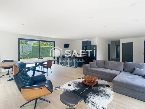 Maison récente de plain-pied avec beau jardin et garage dans bel environnement