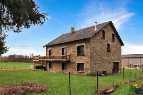 Situated in the countryside is this spacious stone-built 5 bedroom house with large garage and workshops underneath the living area. The property is placed centrally within grounds of 2 000m2. Entering the house you arrive into a large central entran...