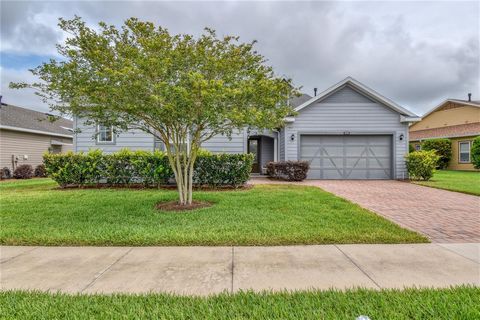 RARE THREE-BEDROOM IMAGINE In the All-Ages area of Ocala Preserve built by SHEA HOMES with 3-CAR GARAGE overlooking DRA (Dry Retention Area) with GORGEOUS CYPRESS TREES on OVERSIZED LOT. This home is NOT in the age-restricted area - this is AN ALL AG...