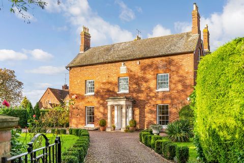 This spacious, Georgian fronted, country home lies within the centre of the picturesque parish and village of Upper Strensham. Strensham Farm boasts a broad range of original features including traditional flagstone flooring, exposed beams and featur...