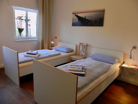 The bright and sunny apartment consists of 1 living-room with balcony, 1 sleeping-room, corridor, shower bath, a modern kitchenette with dishwasher. 1-2 persons feel comfortable here. A private parking space is optional in the garage (double parking ...