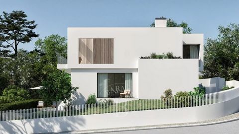 Villa contemporaine de 3 chambres avec vue sur la mer. Située dans le quartier de Murches à Cascais, elle dispose d'un jardin avec piscine et d'un garage. Livrée clé en main avec de bons matériaux et finitions.