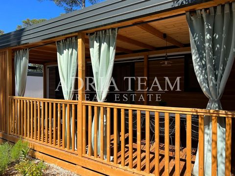 A MOBILE HOME of the Pano Neo type is for sale in the camp in Biograd na Moru. PROPERTY DESCRIPTION: - 2 bedrooms; - 2 bathrooms; - living room + kitchen + dining room; - terrace; - sold furnished and with equipment Biograd na Moru, a town and port i...