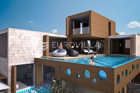 Villa of interesting design, located in an extremely attractive bay on the island of Korcula. With a total gross area of 400 m2, this concept villa fully takes advantage of the visual advantages of the location, which is only 5 m from the sea. The bu...