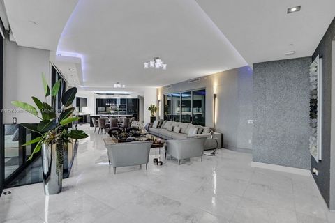 DRIVE YOUR CAR RIGHT INTO YOUR LIVING ROOM! This BRAND NEWLY FINISHED 4 bedroom AND 4 1/2 bathroom apartment at Porsche Design Tower. Features a 2 car garage that leads to the living room and a heated salt water pool/jacuzzi on the terrace. Enjoy liv...