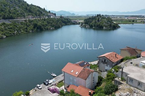 Ploče, a building plot of 440 m2 with a conceptual building project for a residential building with a view of the nearby lake and the sea, located in an excellent location. The residential building project consists of 3 residential units with storage...