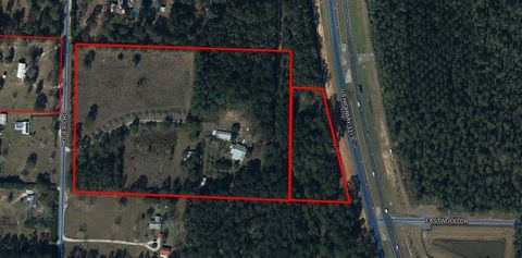 Great Opportunity to purchase a beautiful property waiting for you to make it your own. This 14.5 acres has wild blueberries, scuppernong grapes and various fruit trees scattered throughout.This property at one time had various large gardens in its f...