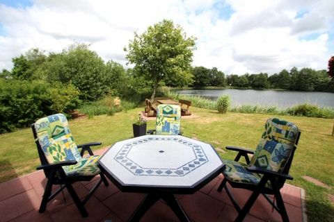 This holiday home offers plenty of space for large families with its two apartments. Each apartment is modern and high-quality equipped and has its own terrace with a lake view. The North Sea comes and goes, but the small lake on which this house sta...