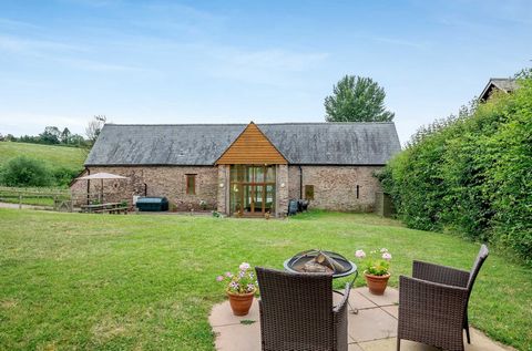 Situated on the edge of Llangarron, a much sought-after village community close to Ross-on-Wye, is this charming barn conversion offering a wealth of period features, with bright and spacious accommodation. The property is set within a plot of a fift...
