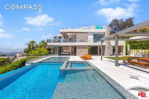 Welcome to the Laurel Estate, celebrating exquisite modern architecture at a grand scale, harmoniously blended with thoughtful design to create an unrivaled lifestyle with spectacular jaw-dropping views of the Pacific Ocean, city, and downtown Los An...