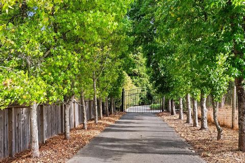 Tree lined Gated entrance opens to this exceptional and pin drop quiet 2.25 acre countryside bursting with character and opportunity! Coastal redwoods, Japanese cedar, Bay trees, apples and others peppered with ornamentals provide a fragrant perimete...