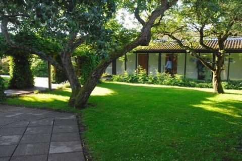 This inviting holiday home accommodates up to three guests, making it ideal for small families or couples. It features a comfortable living area with a TV for entertainment, while the bedroom includes a double bed and a single folding bed for added f...