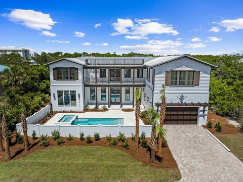 Indulge in the ultimate luxury coastal living experience with this exquisite new construction house located in the non-rental gated neighborhood of Sand Cliffs. Designed for those who appreciate fine living, this home offers deeded beach access and a...