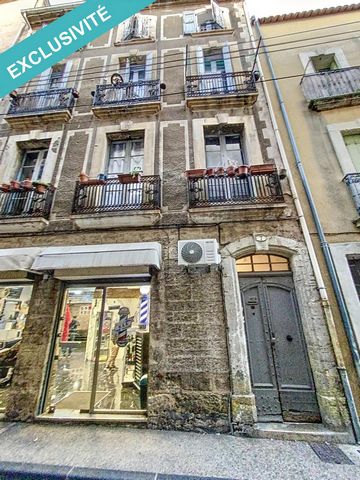 Building of relationship - 3 apartments and a commercial space Exclusively, I have the pleasure to propose you in the historic center of the city of Pézenas, this building of report which offers an interesting opportunity of investment. Close to shop...