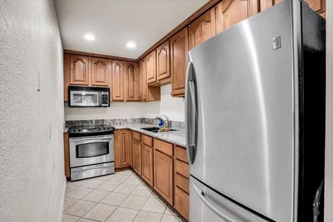 Welcome to your new home in Palm Springs Villas 1. This updated end unit condo located on the second floor has pool and mountain views. Being an end unit you only have one neighbor and have an additional window providing more light to your dining are...