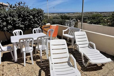 This charming two-room mezzanine villa offers a comfortable stay with a sea view, perfect for up to 6 guests. It features a living room with a two-person convertible sofa, a bedroom with a double bed, and a mezzanine with bunk beds. The villa is not ...