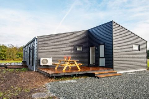 Holiday home with whirlpool and panoramic views of Kvie Lake. The house is extremely stylishly decorated, bright and inviting. All rooms are spacious and with good beds. The kitchen is furnished with all modern aids and in the living room it gives th...
