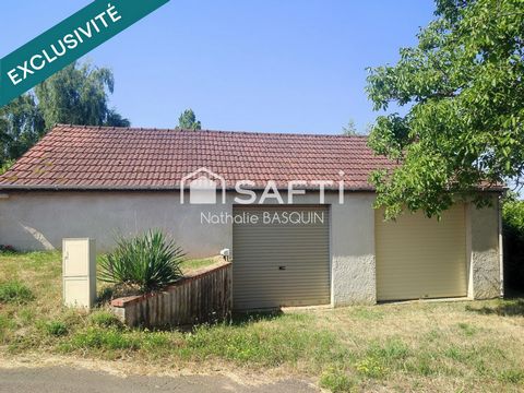 Batiment à usage de garage et d'atelier pour projet de construction.