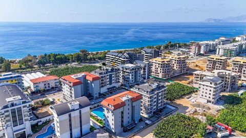 PRIJSHAMER AAN ZEE! EXCLUSIEF APPARTEMENT MET 2 SLAAPKAMERS OP SLECHTS 100 M VAN HET STRAND – KARGICAK/ALANYA Dit modern ingerichte 1+1 appartement op de 4e verdieping biedt het hoogste wooncomfort nabij het strand op een bruto oppervlakte van 55 m²....