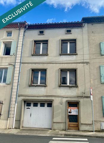 Maison de ville avec garage et jardin