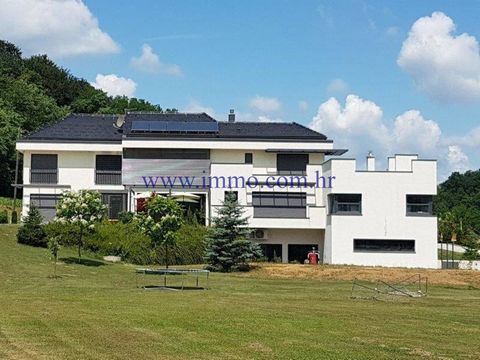 Modern residential-business building of 700 sq.m. for sale, situated on the land of 60 000 sq.m. in a gorgeous location in Tuhelj, center of countryside tourism. This luxury designed object spreads over three levels and includes basement, ground floo...