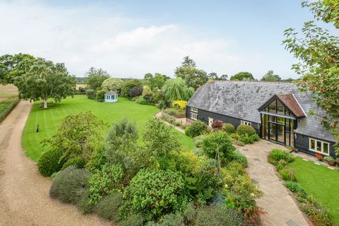 PROPERTY SUMMARY Nobles Barn was re-built approximately 30 years ago in the style of the former barn with the primary vaulted ceiling sitting room accommodating the northern wing and the three-storey living accommodation to the southern wing. It has ...