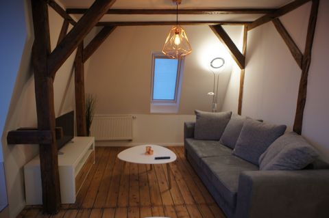 Freshly renovated, charming 70sqm top floor apartment close to Holstentor, city center and train station