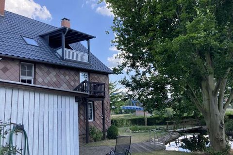 Light-flooded loft with a fantastic view of the Weser. Modern design in a historic farmhouse. The combination of historic farmhouse and modern, bright design gives the holiday apartment a very special atmosphere. Through the windows of the spacious l...