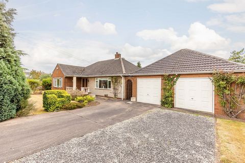 A spacious detached bungalow offering flexible living accommodation with gardens to both the front and rear with an adjoining building plot having outline planning permission.   The property is in need of modernisation throughout but gives huge scope...