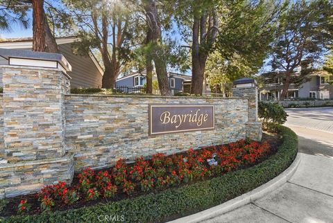 This stunning 3 Bedroom, 3 Bathroom Condominium is located in the gated community of Bayridge ideally located and just minutes from Orange County Airport, The beaches of Corona del Mar, Newport Bay, the Back Bay Nature Preserve and an amazing availab...