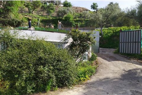 Land divided into 2 plots, one of 1,716m2 consisting of 2 buildings; 1 tool house of 40m2 and a house halfway to finish of about 70m2 approx. The second plot consists of 1,307m2 on a slope. It has its own water well, septic tank and electricity suppl...